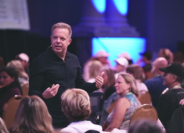 Dr Joe speaking with retreat attendees